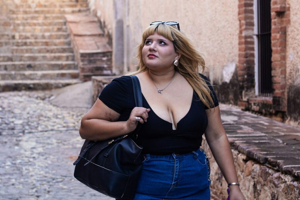 Solo Woman Traveler Exploring Street - Travel Meadow Guide